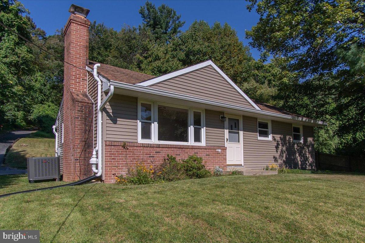 8108 Edgewood Church Road Frederick, MD 21702 - Photo 2 of 37 Charming home nestled in lush greenery.