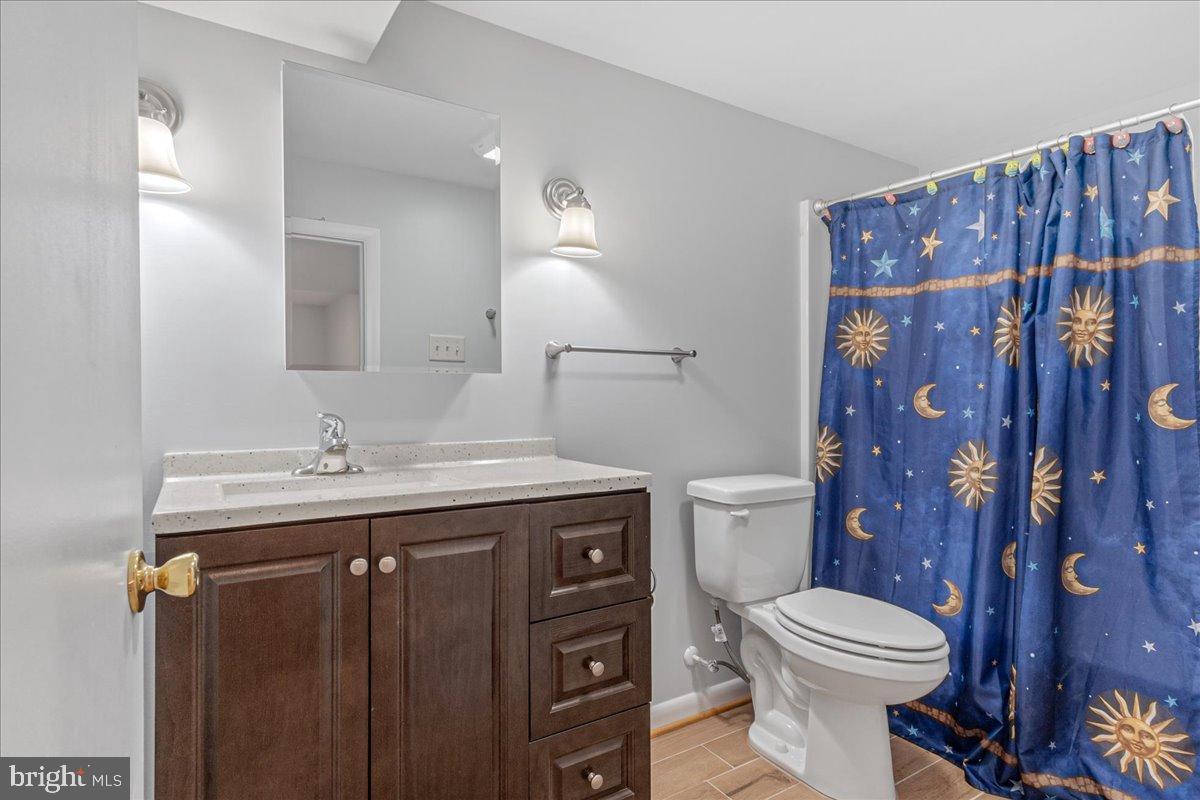 8108 Edgewood Church Road Frederick, MD 21702 - Photo 27 of 37 Charming bathroom with celestial shower curtain.