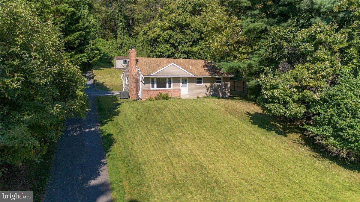 8108 Edgewood Church Road Frederick, MD 21702 - Photo 4 of 37 Charming home nestled in lush greenery.
