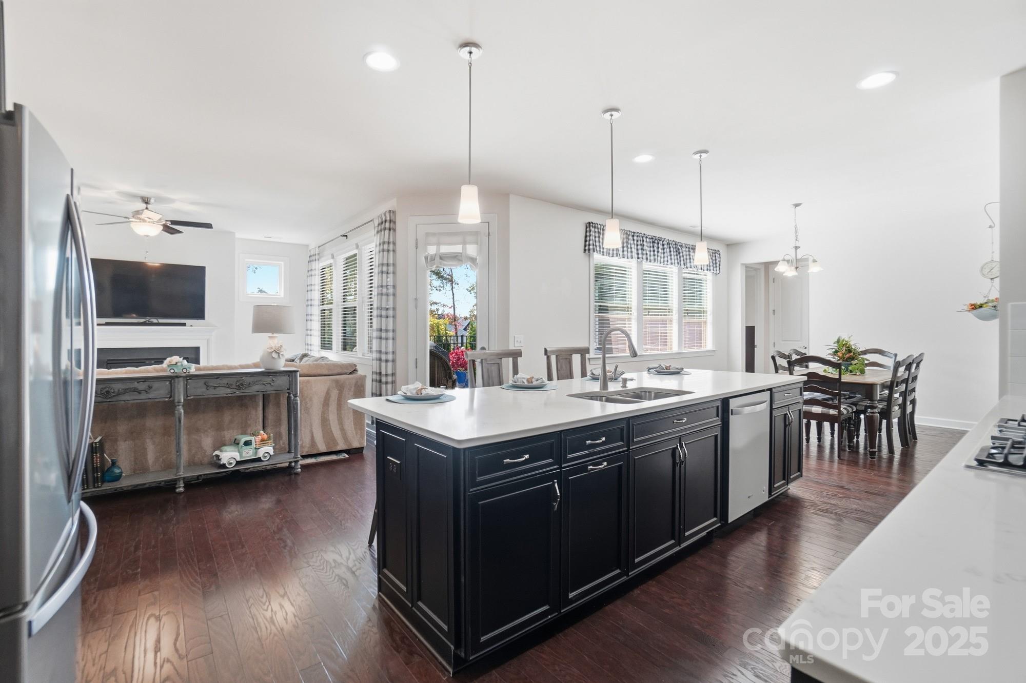 1296 Independence Street Tega Cay, SC 29708 - Photo 11 of 27 a large kitchen with lots of counter space and a sink