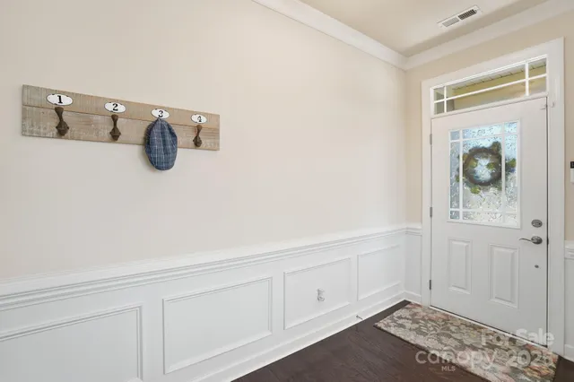 a view of walk in closet with cabinet