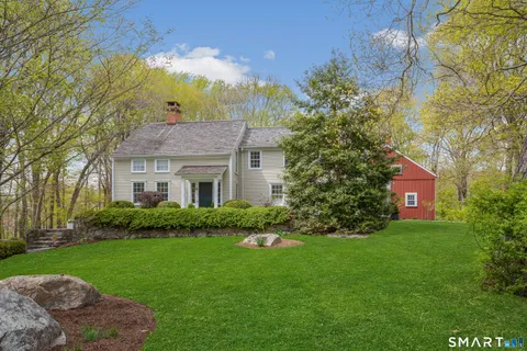 a view of a house with a garden
