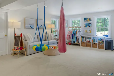 a view of game room with gym equipment