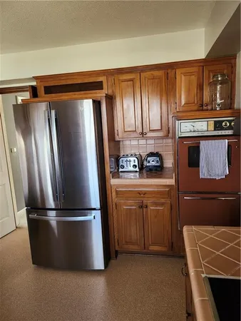 $430,000 | 805 South Country Club Drive, Butler, MO 64730