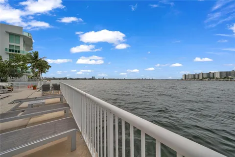 a view of a balcony with an ocean view