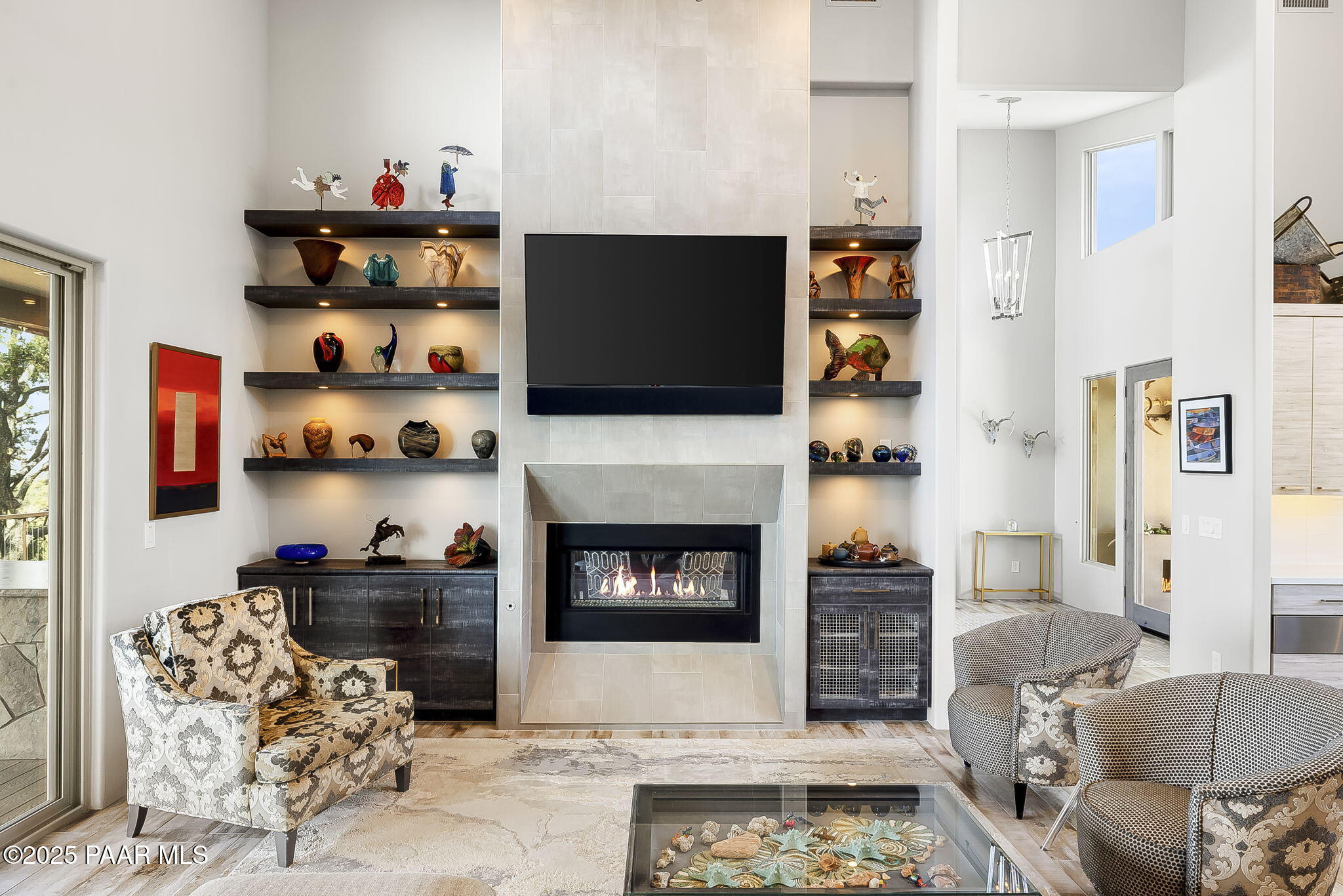 5245 West Three Forks Road Prescott, AZ 86305 - Photo 15 of 68 a living room with furniture and a fireplace