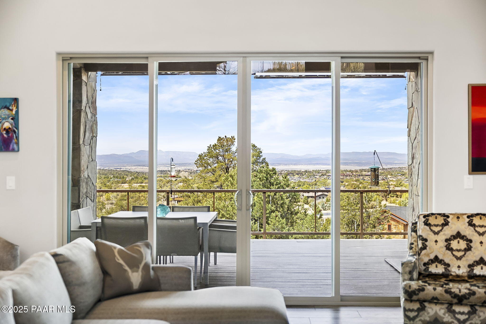 5245 West Three Forks Road Prescott, AZ 86305 - Photo 17 of 68 a living room with furniture and floor to ceiling windows