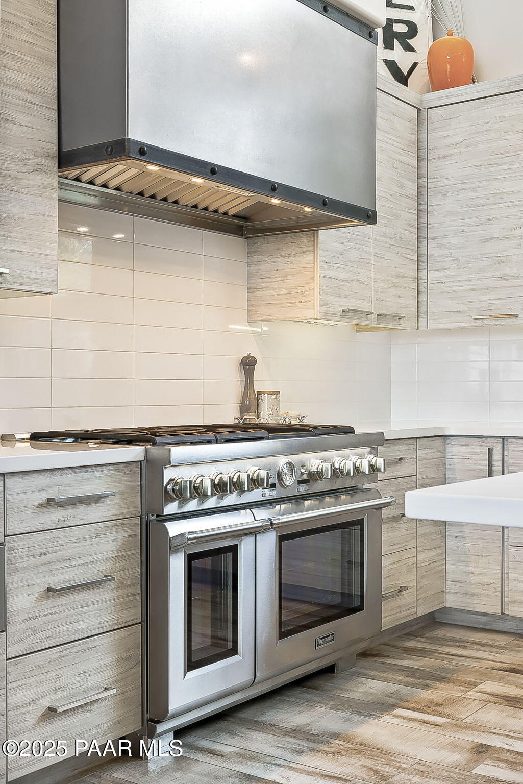 5245 West Three Forks Road Prescott, AZ 86305 - Photo 24 of 68 a stove top oven sitting inside of a kitchen