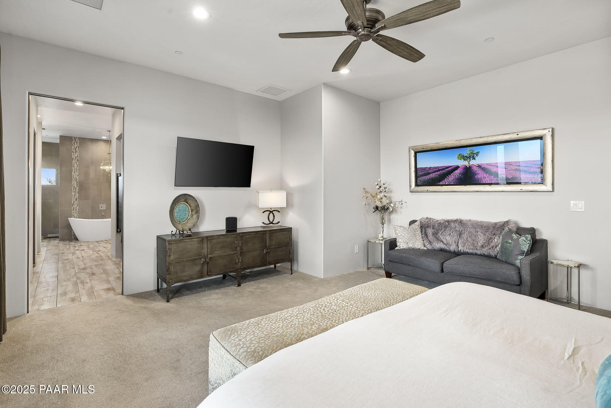 5245 West Three Forks Road Prescott, AZ 86305 - Photo 29 of 68 a living room with furniture and a flat screen tv