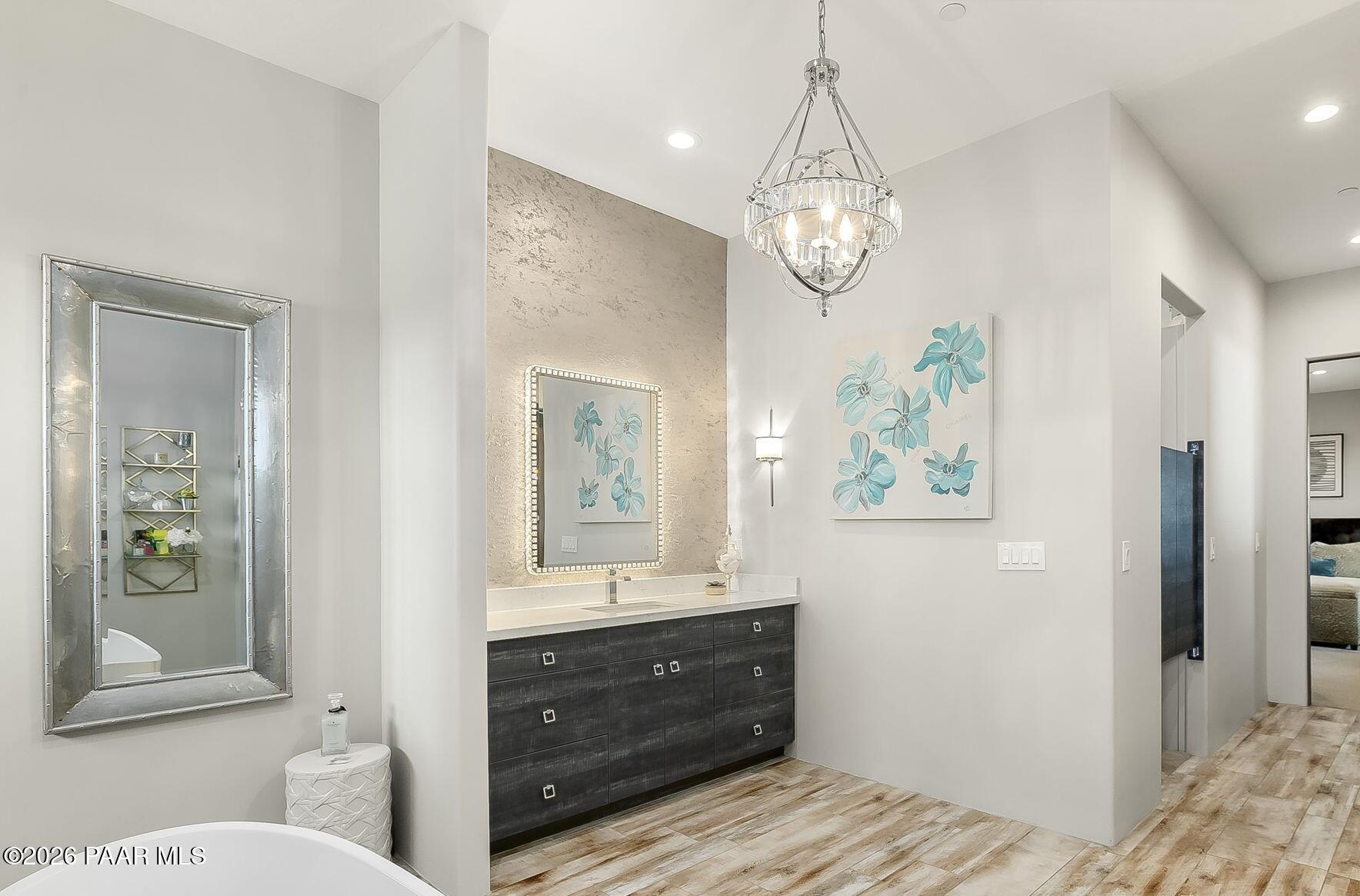 5245 West Three Forks Road Prescott, AZ 86305 - Photo 34 of 68 a bathroom with a sink a toilet and shower