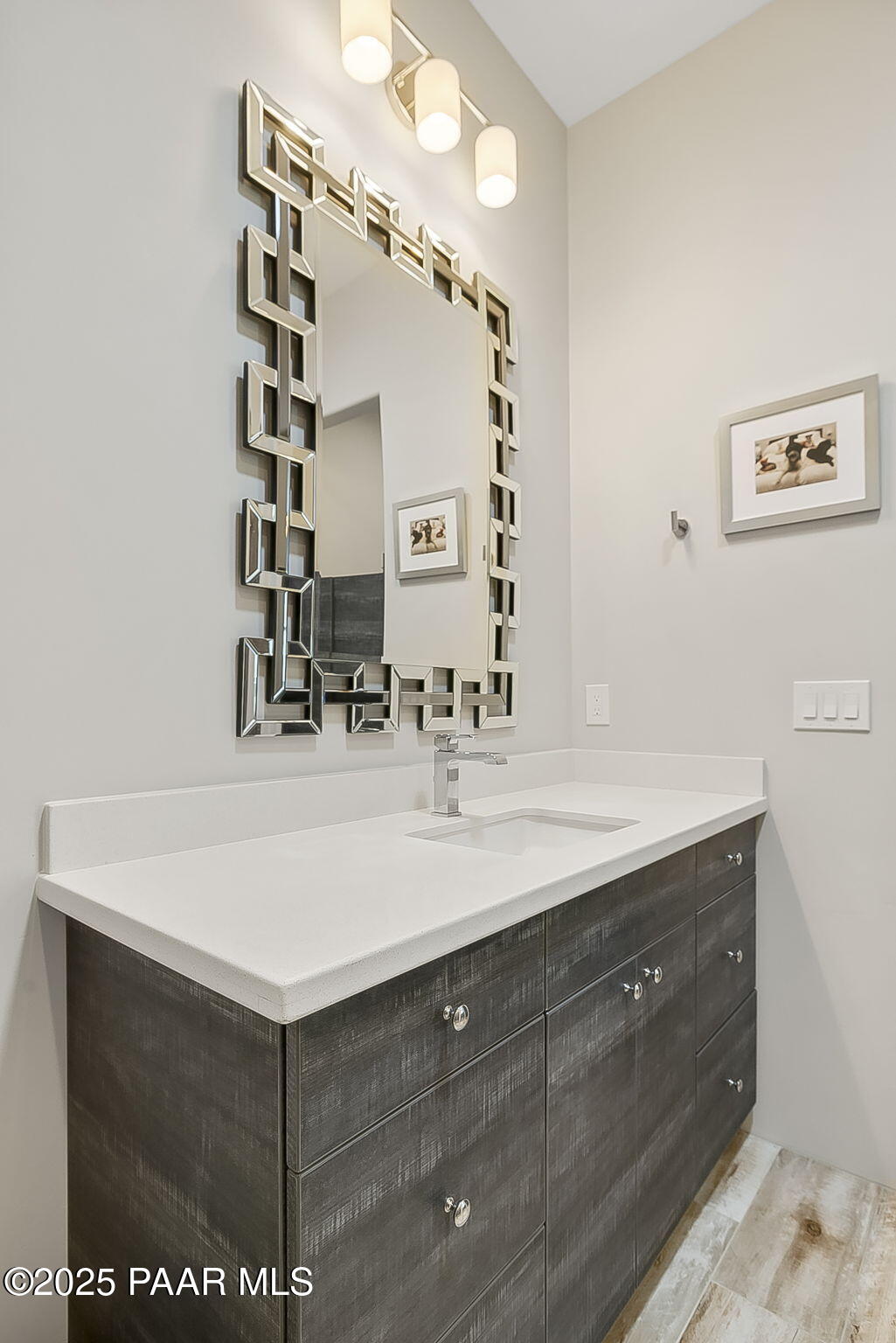 5245 West Three Forks Road Prescott, AZ 86305 - Photo 47 of 68 a bathroom with a sink vanity and a mirror