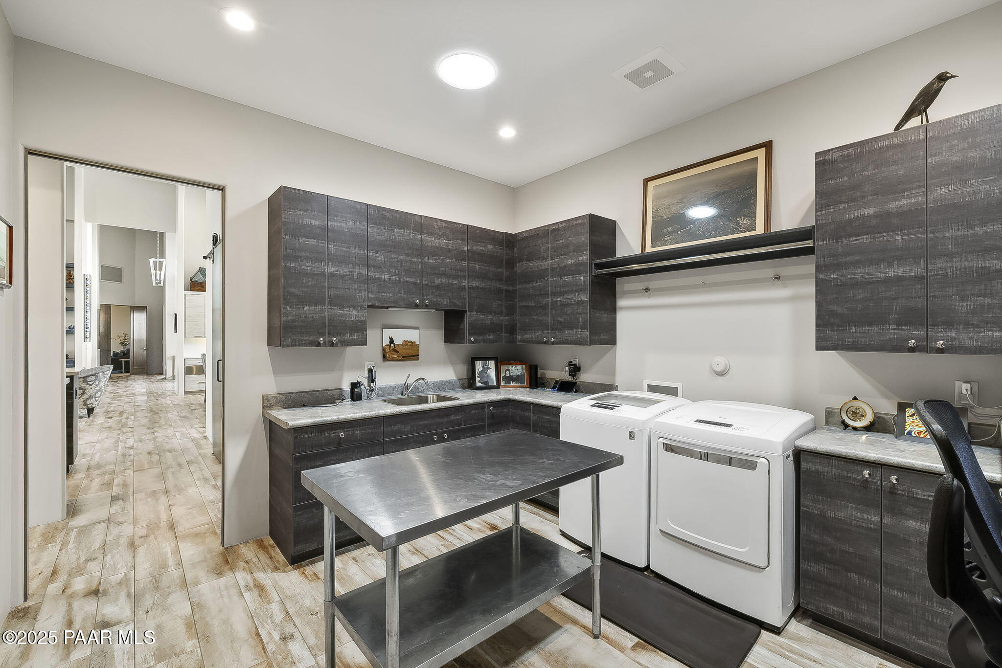 5245 West Three Forks Road Prescott, AZ 86305 - Photo 50 of 68 a kitchen that has a stove and a table