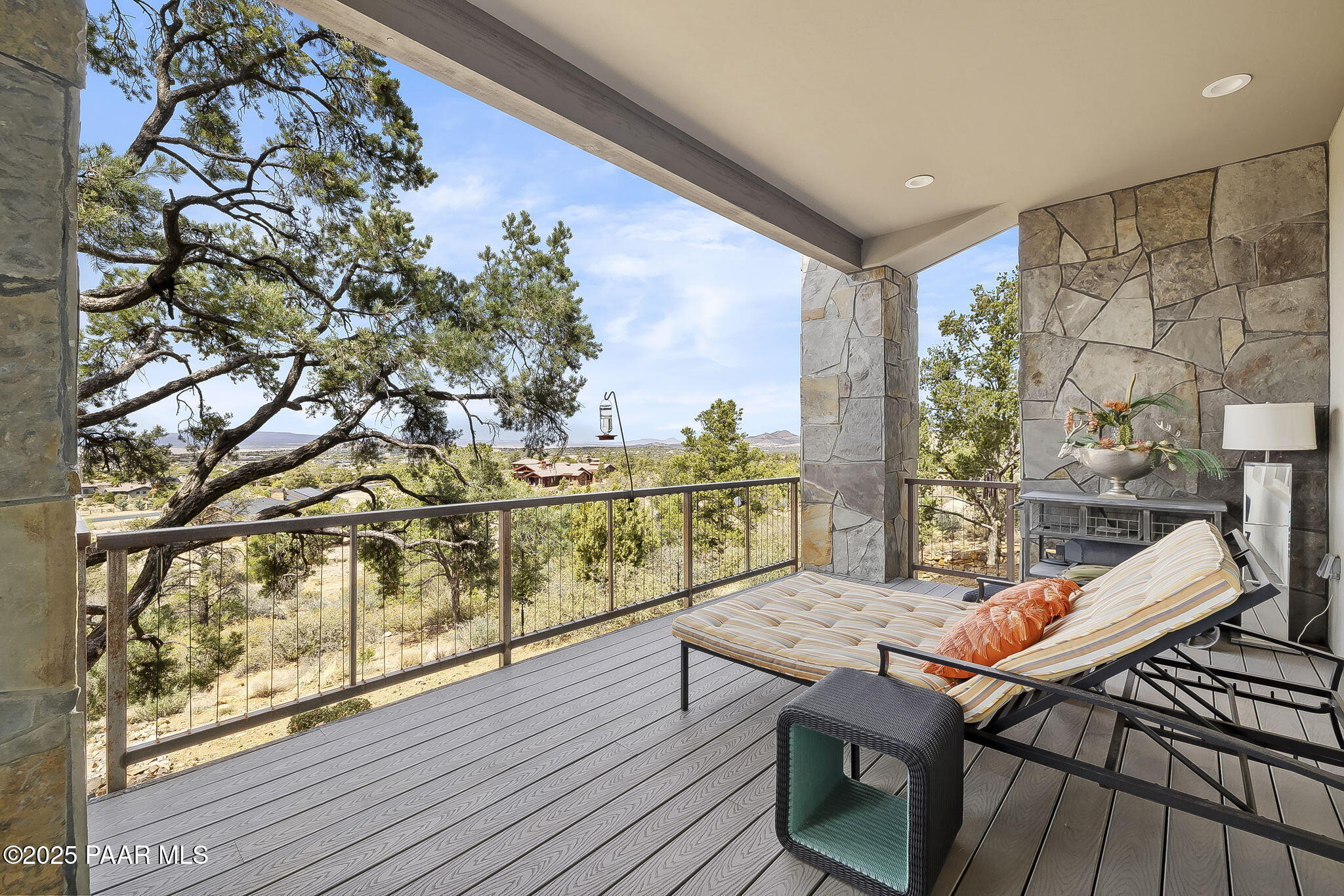 5245 West Three Forks Road Prescott, AZ 86305 - Photo 55 of 68 a view of a balcony with furniture and wooden floor