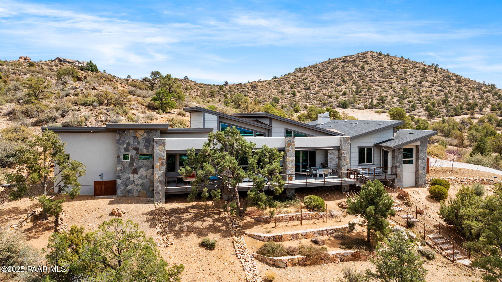 5245 West Three Forks Road Prescott, AZ 86305 - Photo 59 of 68 a view of a house with a yard covered with snow in front of house