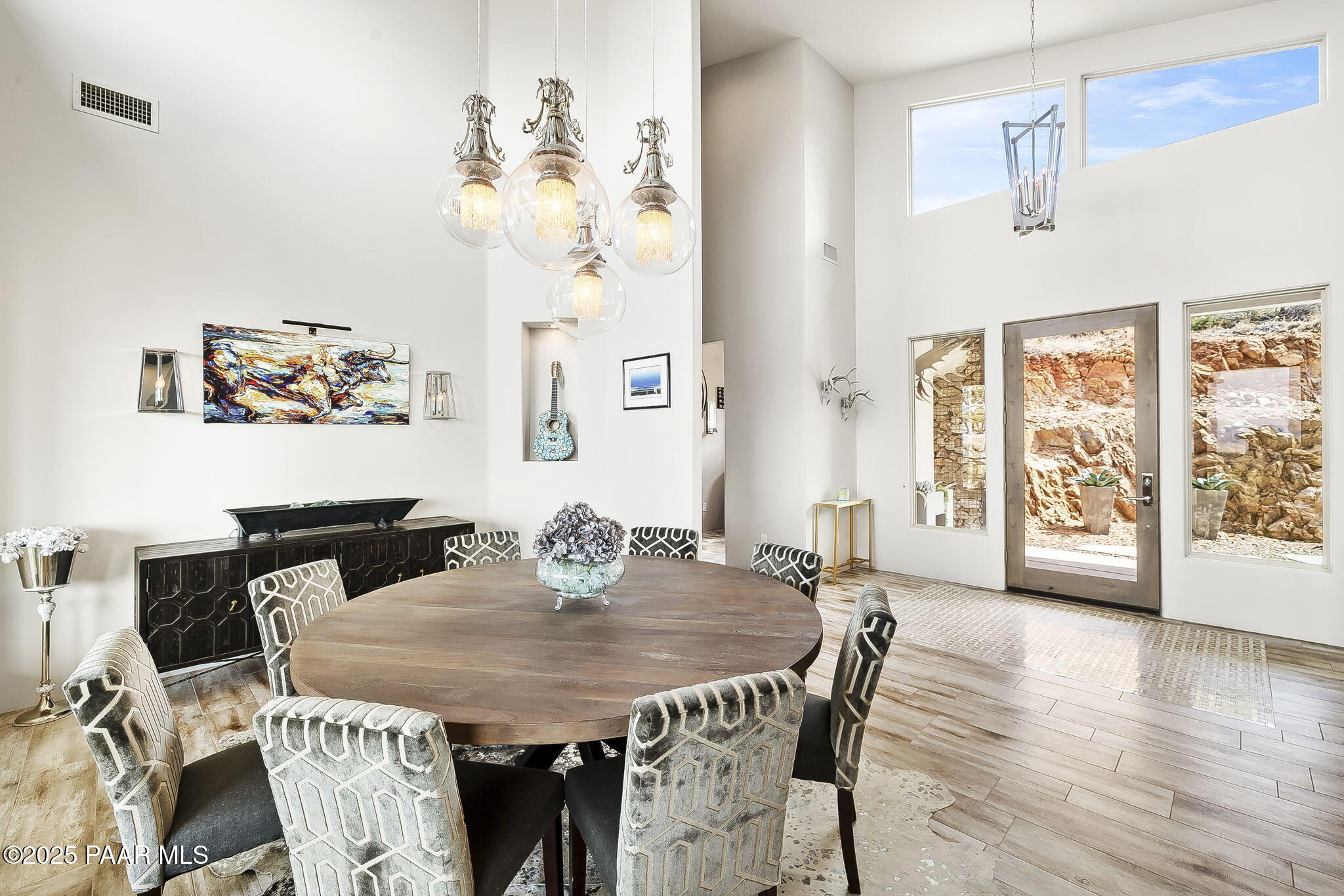 5245 West Three Forks Road Prescott, AZ 86305 - Photo 8 of 68 a view of a dining room with furniture and wooden floor