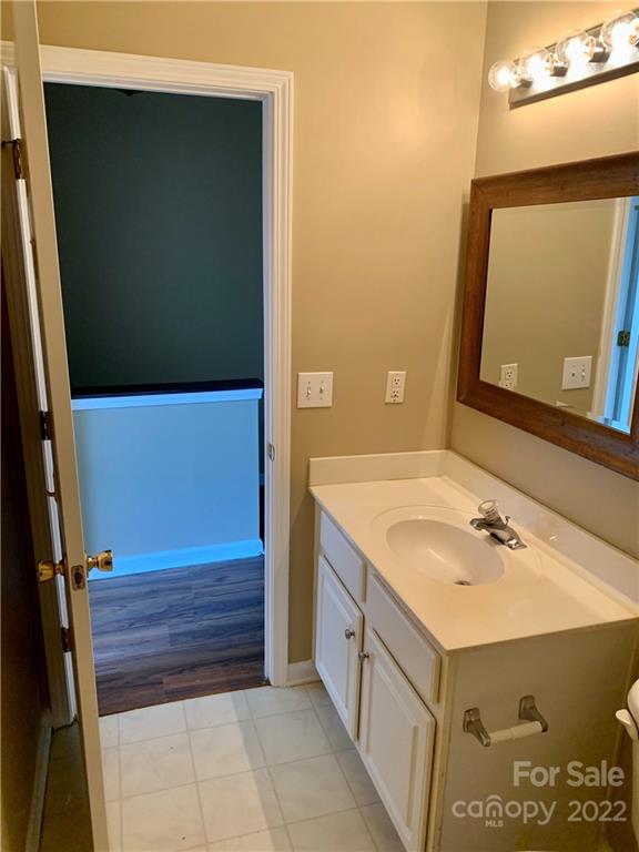 927 Azurine Circle Fort Mill, SC 29708 - Photo 18 of 18 a bathroom with a sink and a mirror