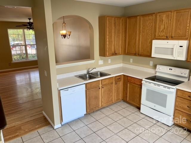 927 Azurine Circle Fort Mill, SC 29708 - Photo 6 of 18 a kitchen with a sink cabinets and appliances
