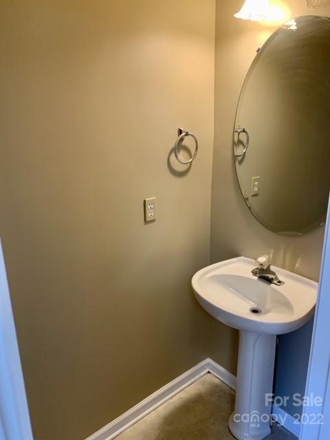 927 Azurine Circle Fort Mill, SC 29708 - Photo 8 of 18 a bathroom with a sink and mirror