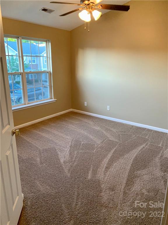 927 Azurine Circle Fort Mill, SC 29708 - Photo 10 of 18 a view of an empty room with a window
