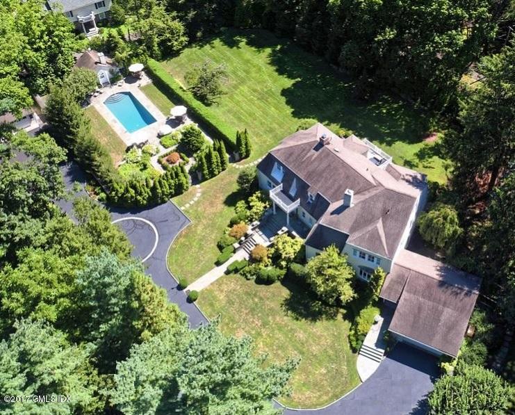 171 North Maple Avenue Greenwich, CT 06830 - Photo 12 of 16 an aerial view of a house with a yard and potted plants