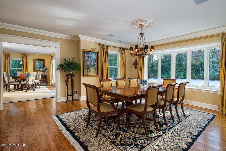 171 North Maple Avenue Greenwich, CT 06830 - Photo 5 of 16 a view of a dining room with furniture wooden floor and chandelier
