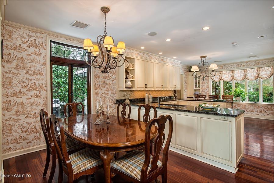 171 North Maple Avenue Greenwich, CT 06830 - Photo 8 of 16 a dining room with furniture a chandelier and window