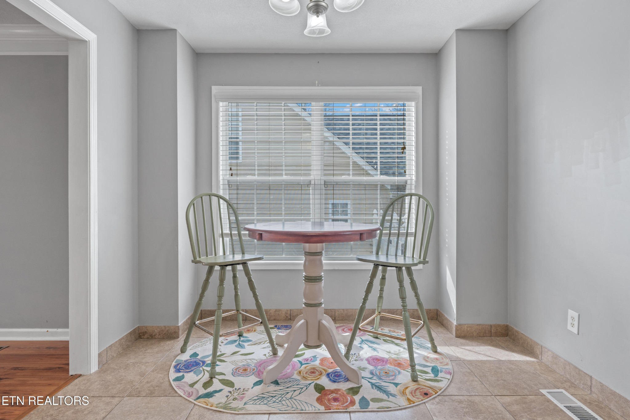 2805 Porch Swing Road Knoxville, TN 37938 - Photo 14 of 48 a view of a room with wooden floor and windows