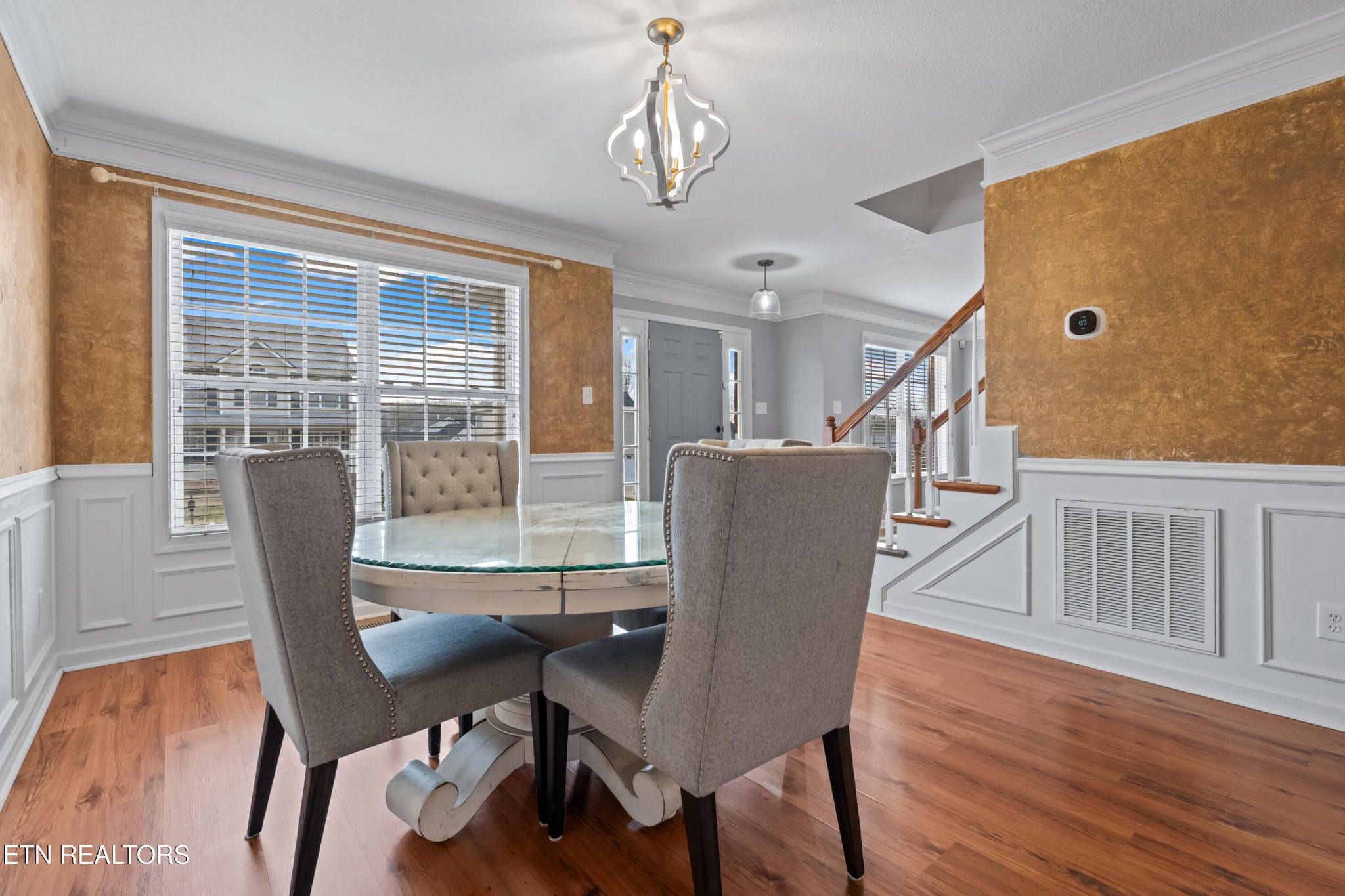 2805 Porch Swing Road Knoxville, TN 37938 - Photo 20 of 48 a dining room with furniture window and wooden floor