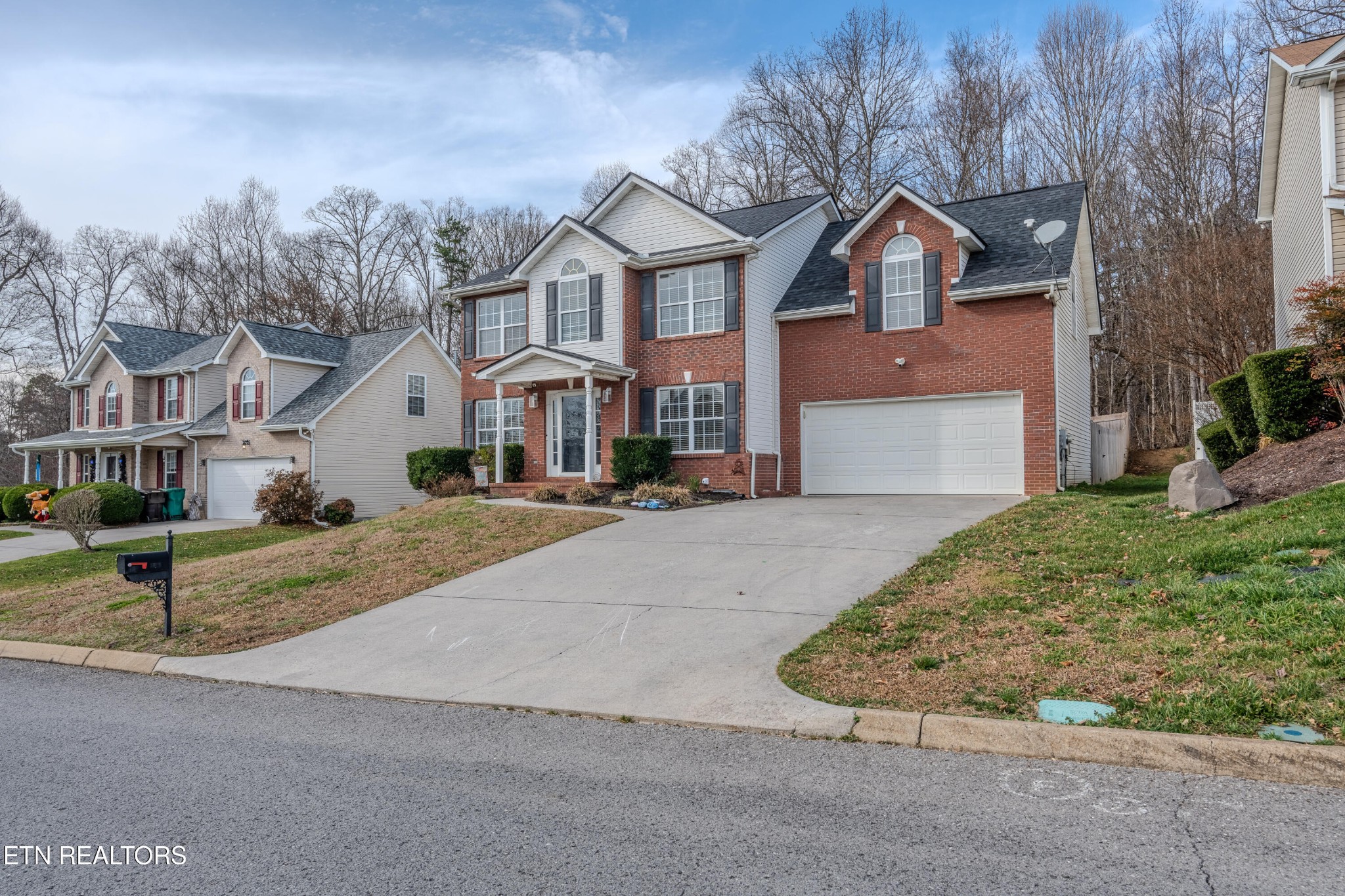 2805 Porch Swing Road Knoxville, TN 37938 - Photo 2 of 48 a front view of a house with a yard