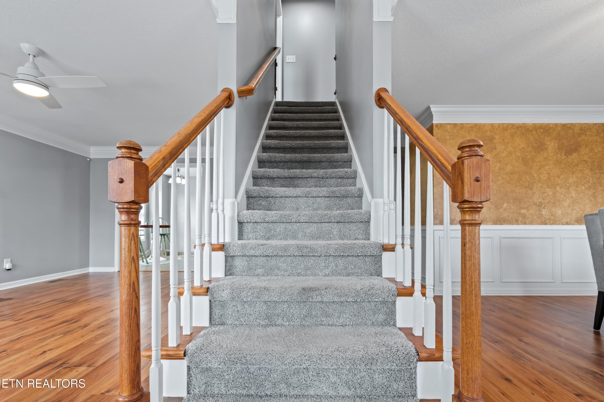 2805 Porch Swing Road Knoxville, TN 37938 - Photo 24 of 48 a view of staircase with wooden floor and white walls