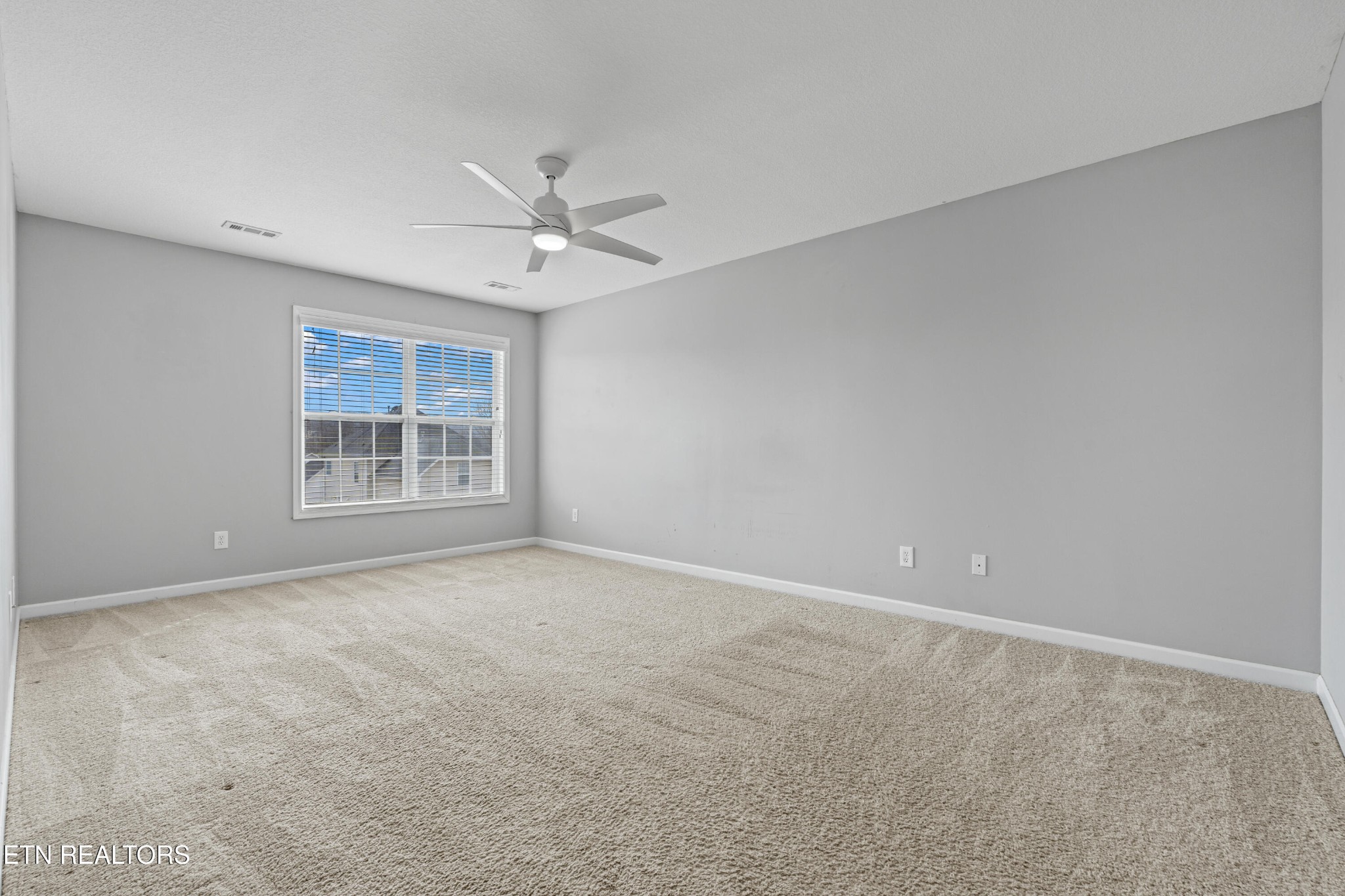 2805 Porch Swing Road Knoxville, TN 37938 - Photo 26 of 48 a view of an empty room with a window
