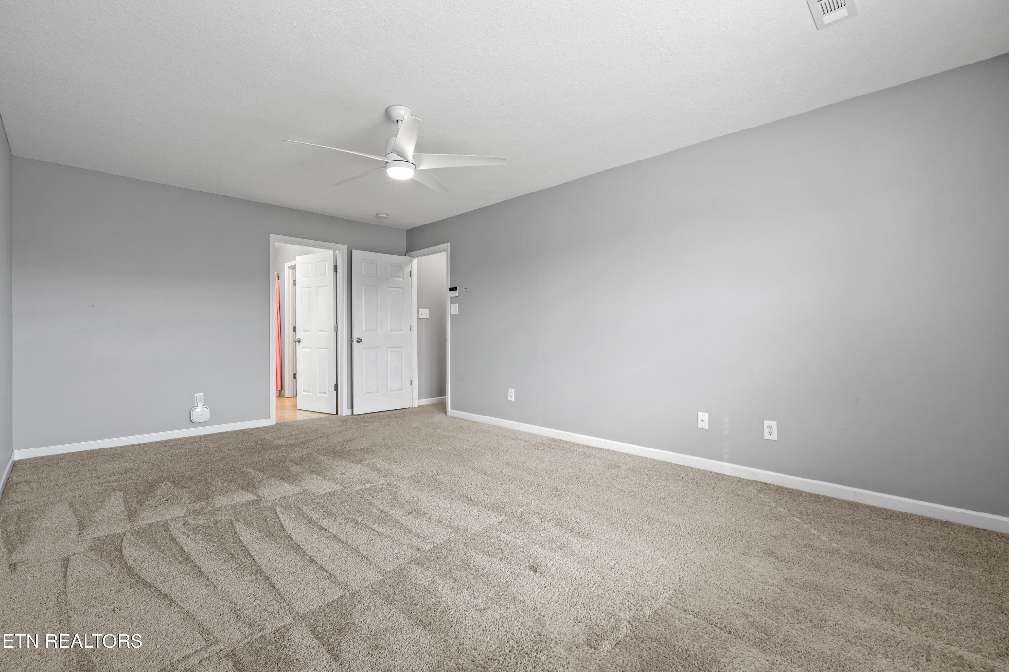 2805 Porch Swing Road Knoxville, TN 37938 - Photo 27 of 48 a view of an empty room with a window