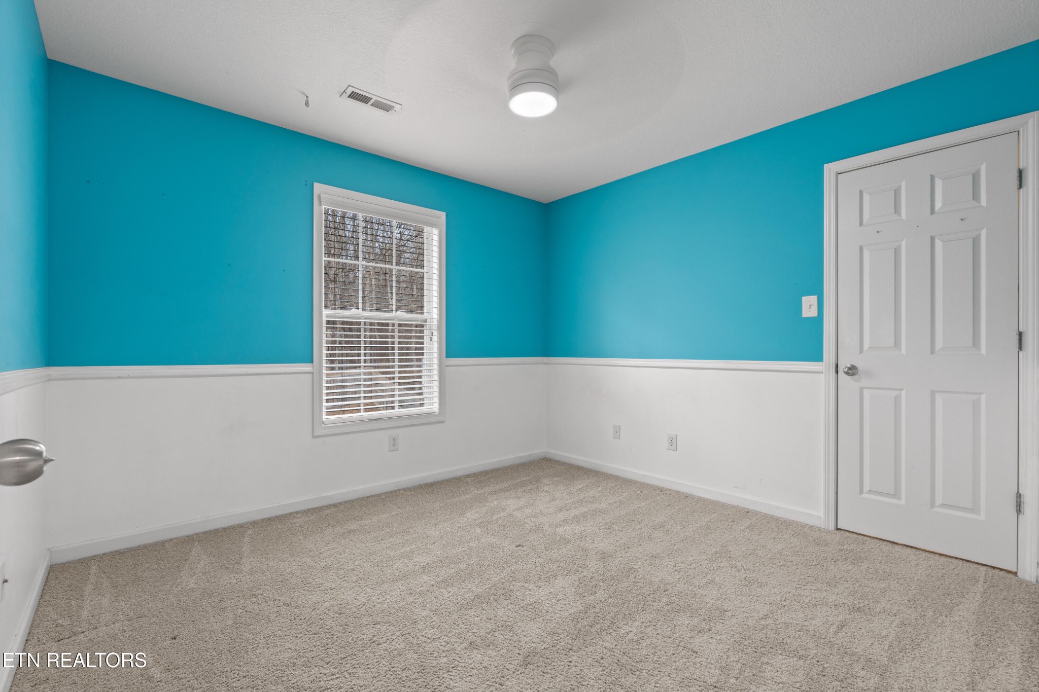 2805 Porch Swing Road Knoxville, TN 37938 - Photo 32 of 48 an empty room with windows