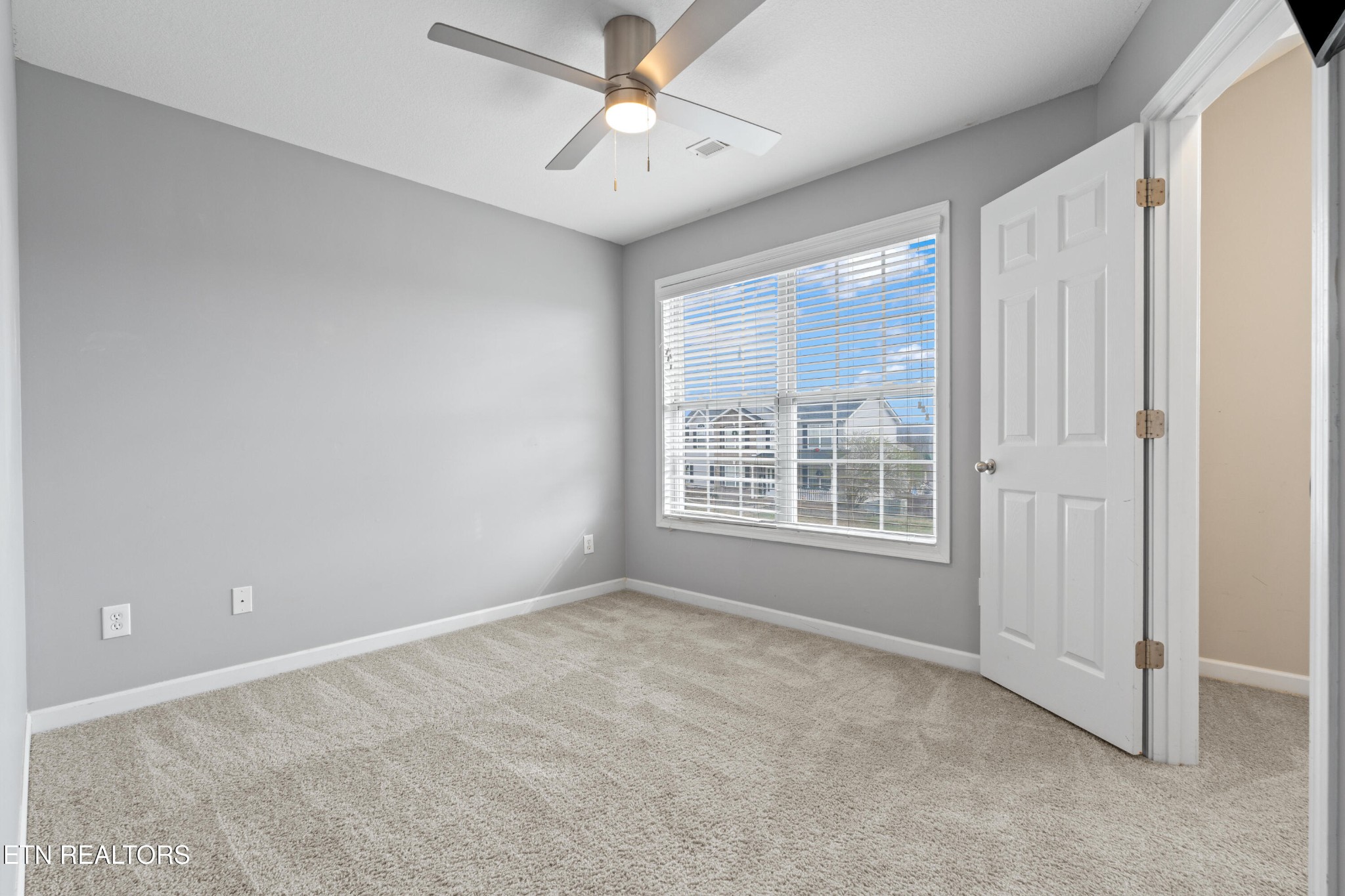 2805 Porch Swing Road Knoxville, TN 37938 - Photo 34 of 48 a view of an empty room with a window