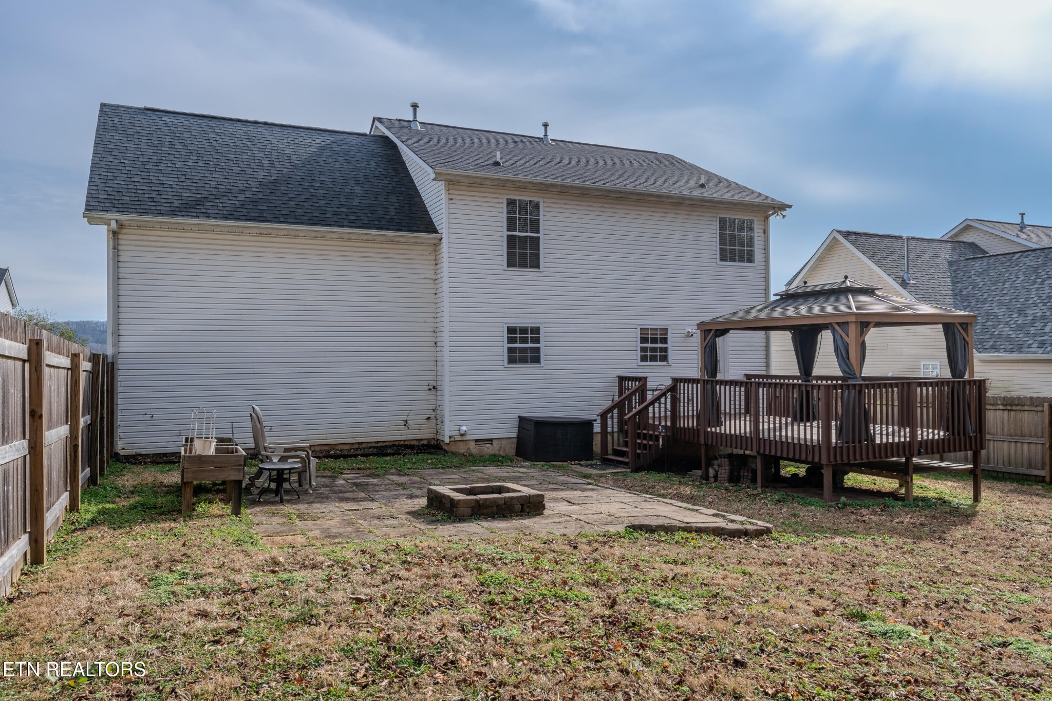 2805 Porch Swing Road Knoxville, TN 37938 - Photo 42 of 48 a view of a house with a yard and sitting area