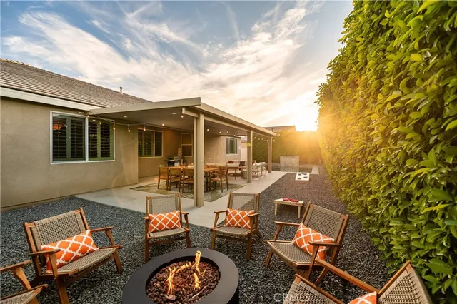 an outdoor space with patio and mountain view