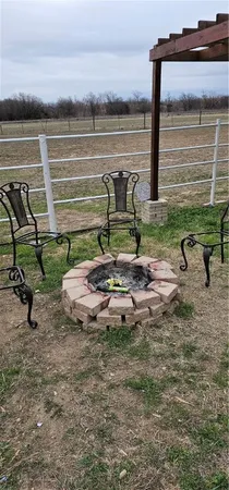 a view of a porch with chairs