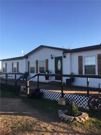a view of a swimming pool with an ocean view