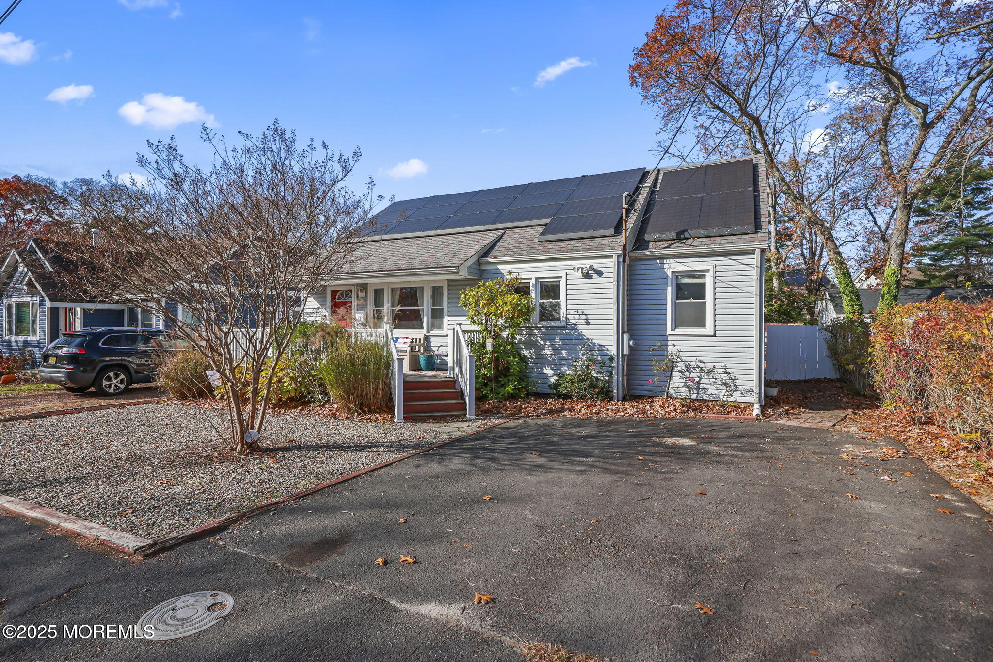 13 Holly Road Brick, NJ 08723 - Photo 2 of 34 a view of a house with a street