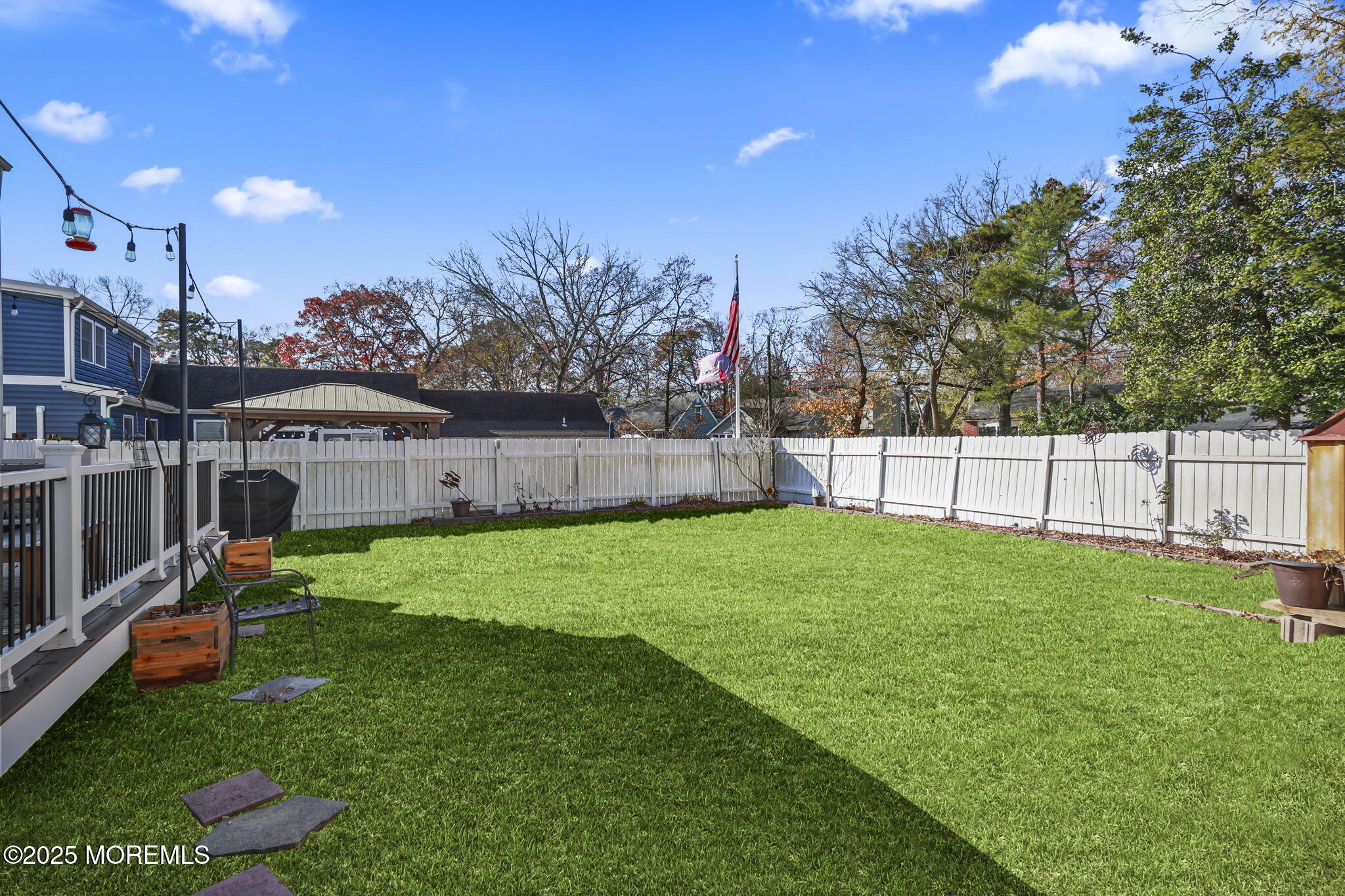 13 Holly Road Brick, NJ 08723 - Photo 33 of 34 a view of backyard with house and green space