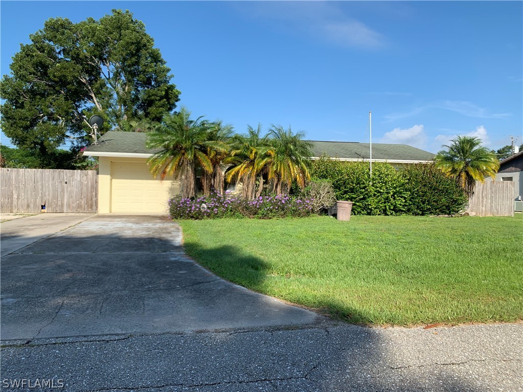 a view of a back yard of the house