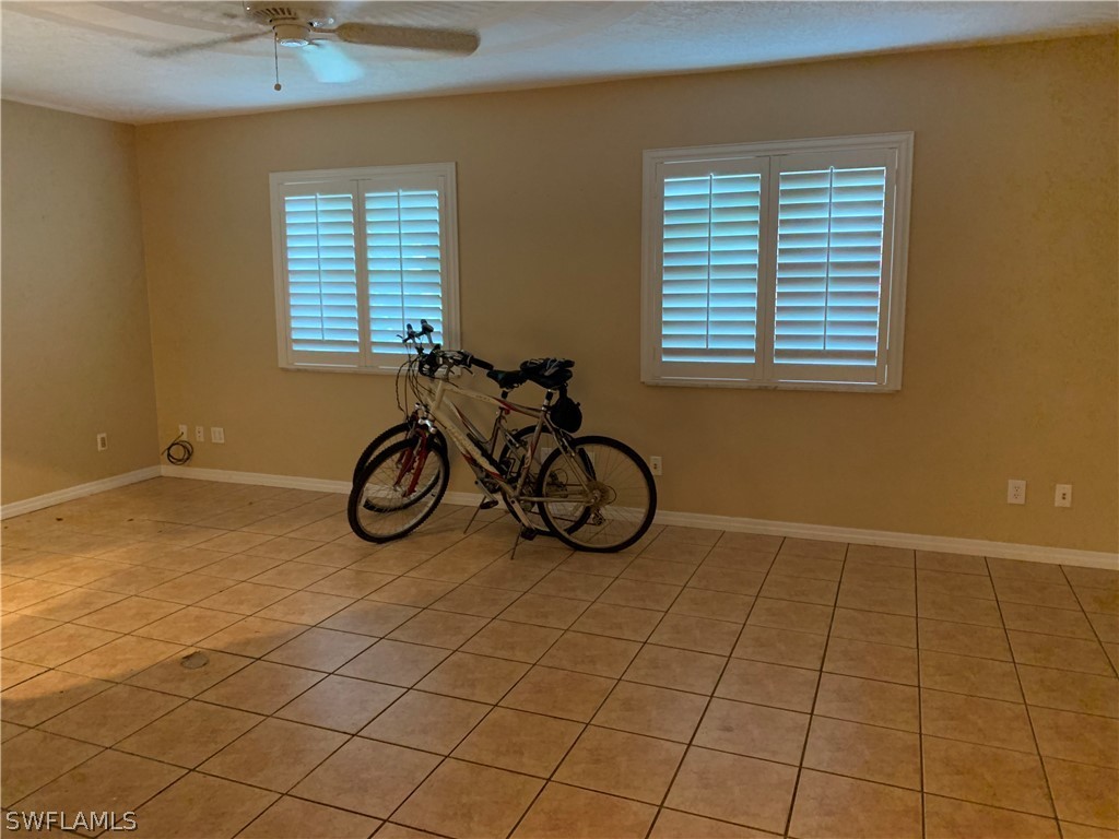 2219 Lily Road Fort Myers, FL 33905 - Photo 12 of 23 a view of a room with windows