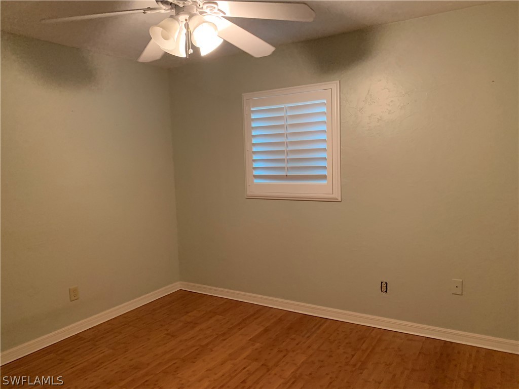 2219 Lily Road Fort Myers, FL 33905 - Photo 18 of 23 an empty room with a window