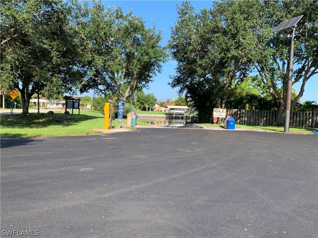 2219 Lily Road Fort Myers, FL 33905 - Photo 5 of 23 a view of street with large trees