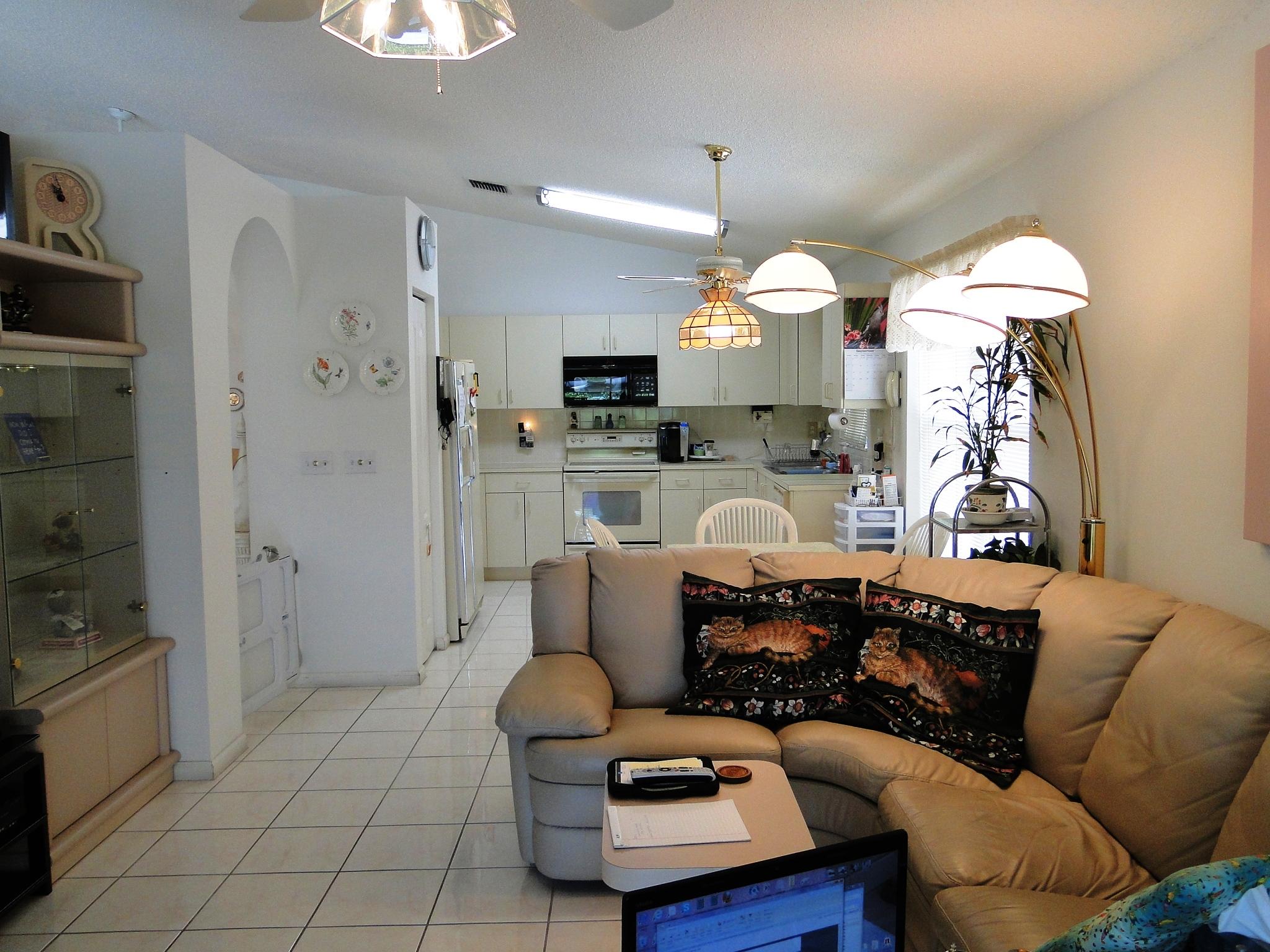 9473 Baritone Court Boca Raton, FL 33496 - Photo 12 of 19 FAMILY ROOM AND KITCHEN