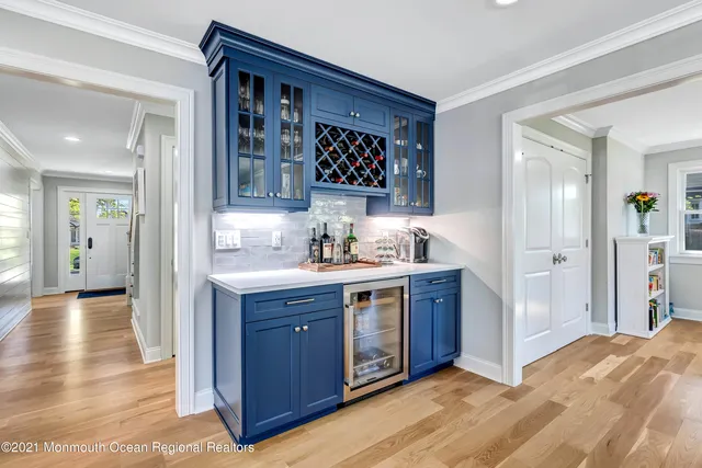 a spacious bathroom with a sink and a mirror