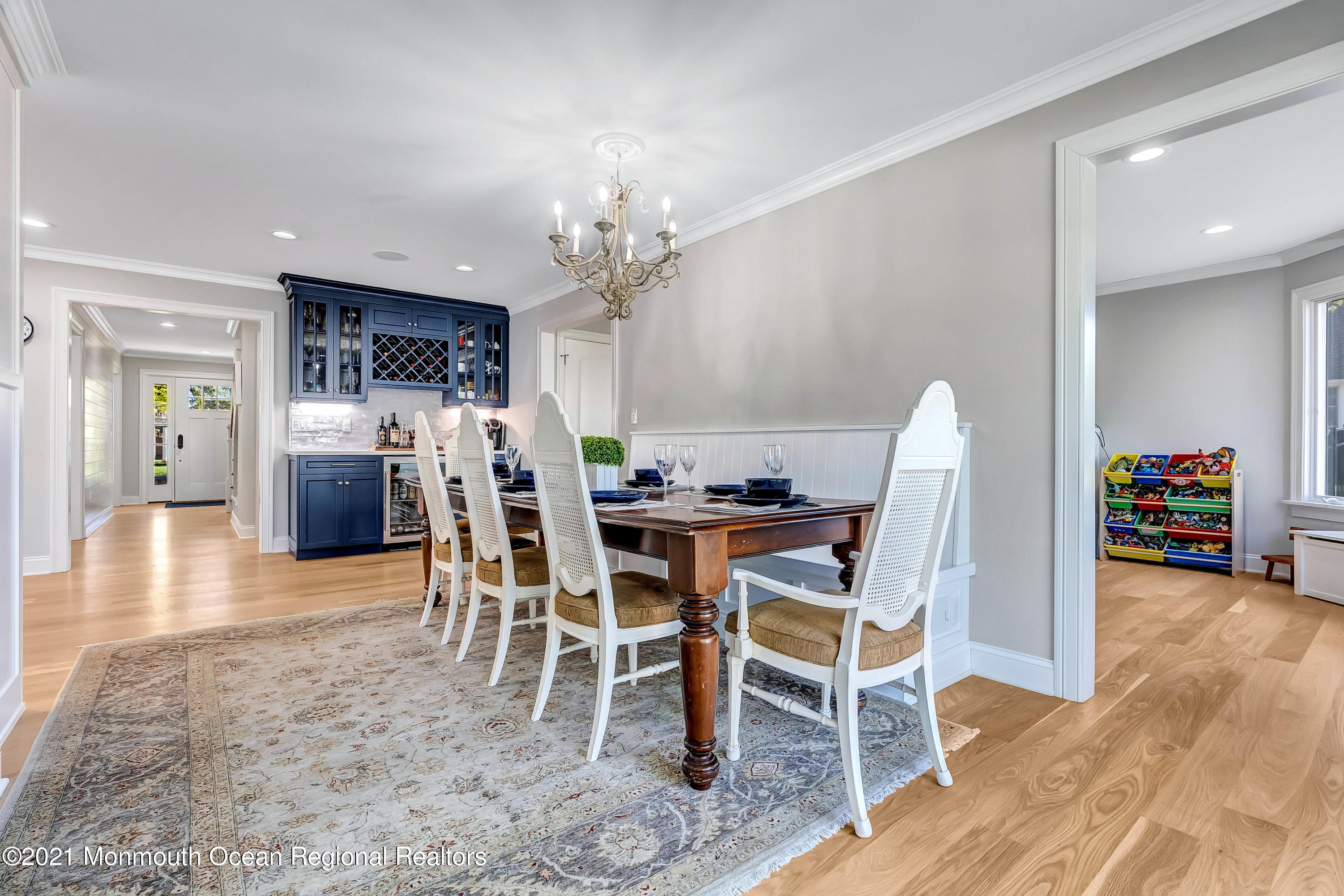 211 Monroe Avenue Spring Lake, NJ 07762 - Photo 15 of 46 a view of a dining room with furniture and wooden floor