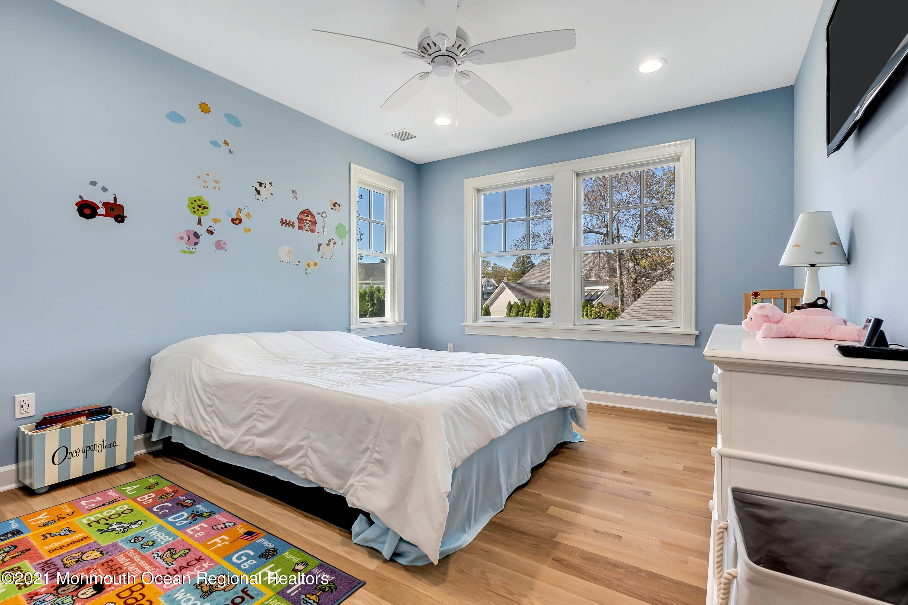 211 Monroe Avenue Spring Lake, NJ 07762 - Photo 29 of 46 a bedroom with a bed and a window