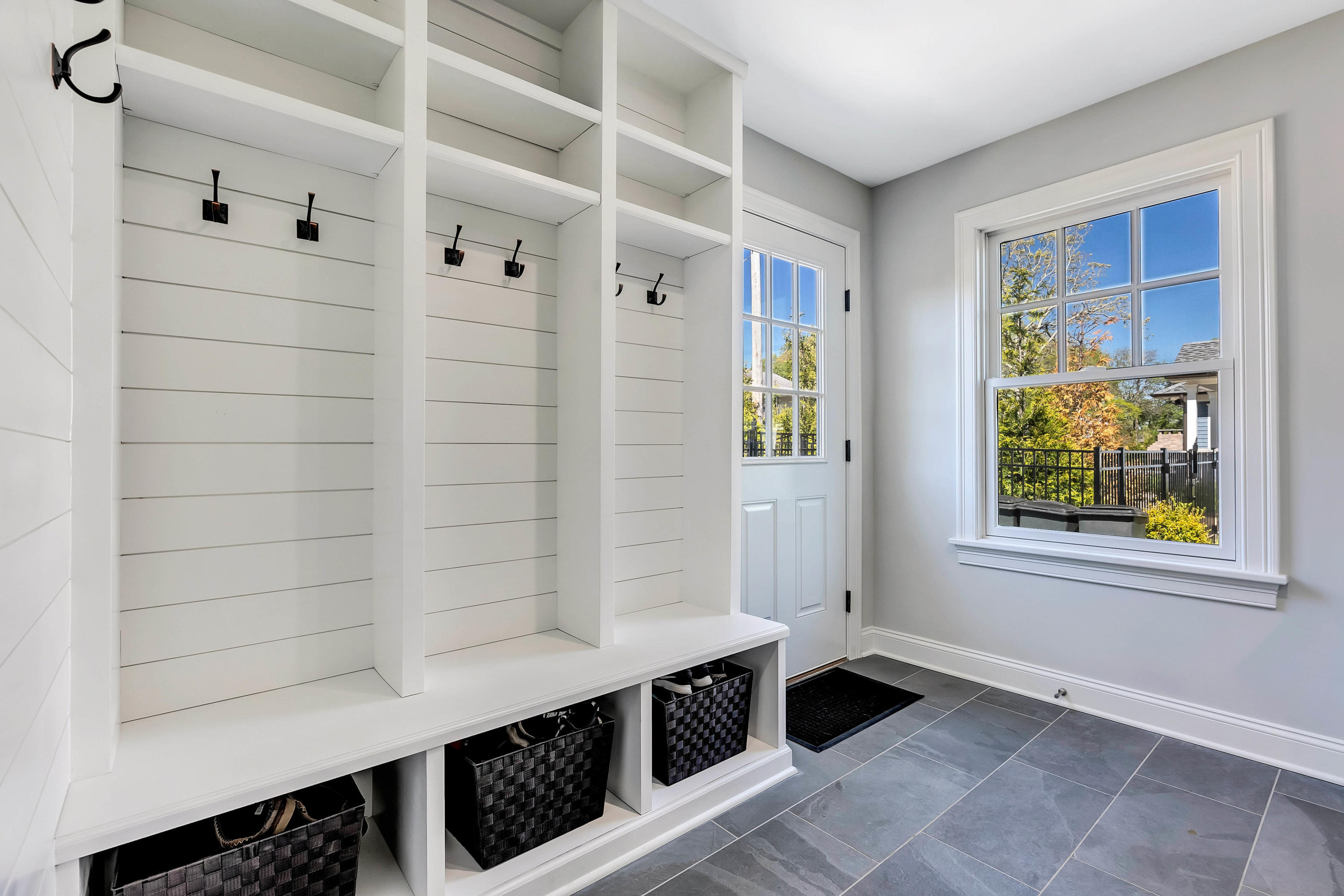 211 Monroe Avenue Spring Lake, NJ 07762 - Photo 31 of 46 a hallway with front door and wooden floor