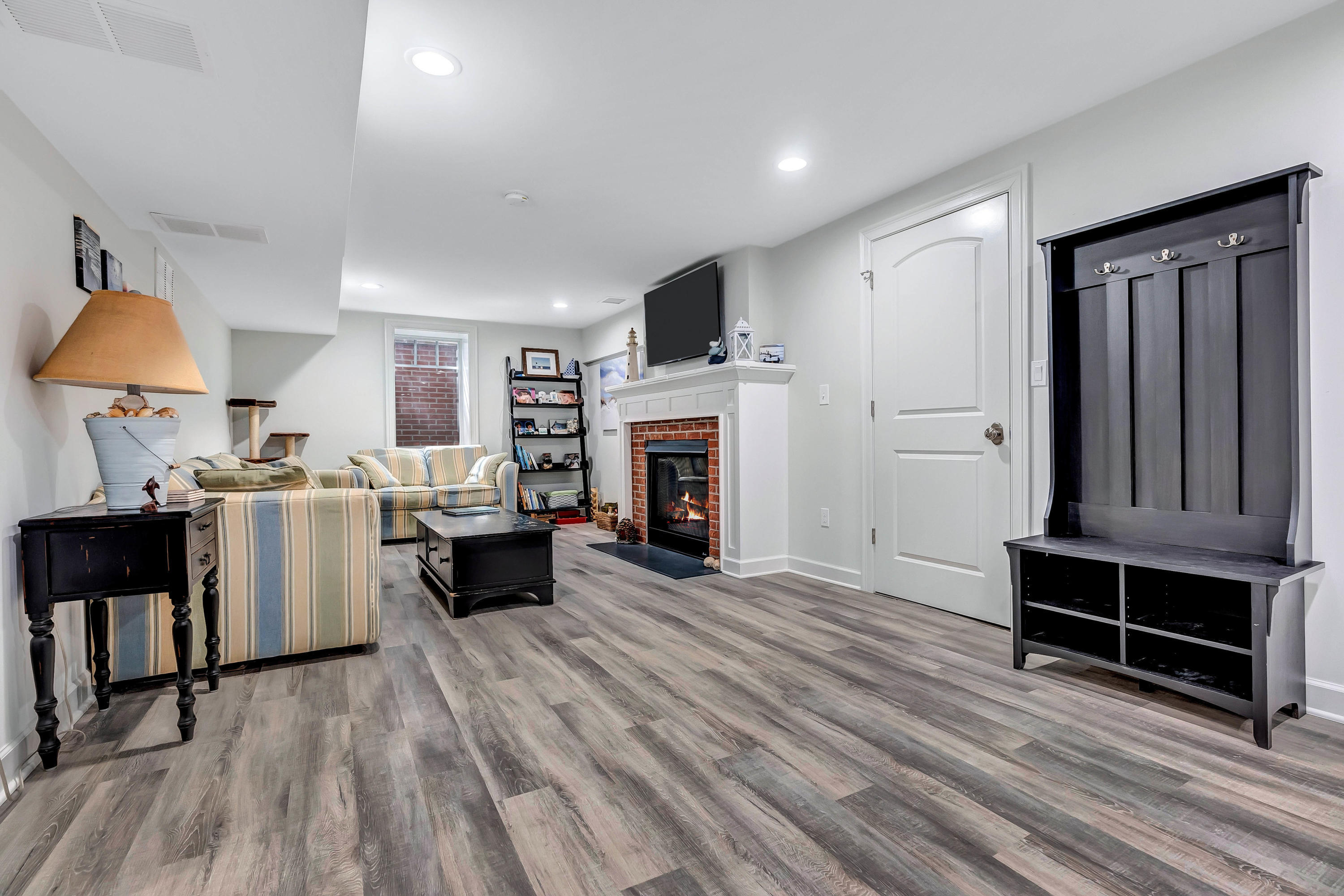 211 Monroe Avenue Spring Lake, NJ 07762 - Photo 34 of 46 a view of kitchen with furniture flat screen tv and refrigerator